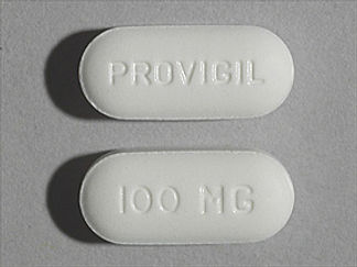 This is a Tablet imprinted with PROVIGIL on the front, 100 MG on the back.