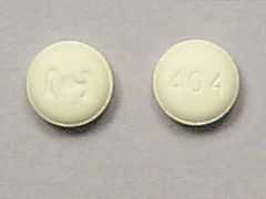This is a yellow round Tablet imprinted with logo on the front, 404 on the back, and is manufactured by TEVA USA.