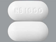 Esto es un Tableta blanco oblongo imprimido con NB 1000 en la parte delantera, nada en la parte posterior, y es fabricado por CARWIN ASSOCIAT.