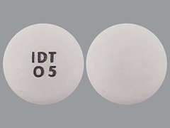 Esto es un Tableta Sólo Por Uso Oral blanco redondo imprimido con IDT  0 5 en la parte delantera, nada en la parte posterior, y es fabricado por PROTEGA PHARMAC.