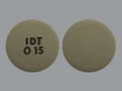 Roxybond: Esto es un Tableta Sólo Por Uso Oral imprimido con IDT  0 15 en la parte delantera, nada en la parte posterior.