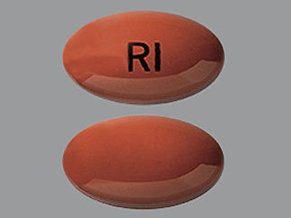 This is a Capsule imprinted with RI on the front, nothing on the back.