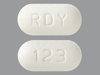 Esto es un Tableta imprimido con RDY en la parte delantera, 123 en la parte posterior, y es fabricado por None.