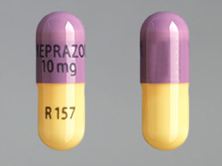 Esto es un Cápsula Dr imprimido con OMEPRAZOLE  10 mg en la parte delantera, R157 en la parte posterior, y es fabricado por None.