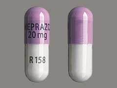 This is a iron gray oblong Capsule Dr imprinted with OMEPRAZOLE  20 mg on the front, R158 on the back, and is manufactured by QUALLENT PHARMA.