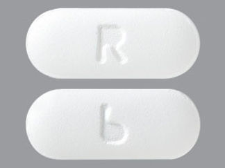 This is a Tablet imprinted with R on the front, 6 on the back.