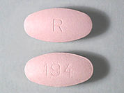 Wal-Fex Allergy: This is a Tablet imprinted with 194 on the front, R on the back.