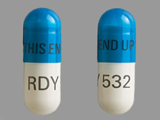 This is a Capsule Dr Sprinkle imprinted with THIS END UP on the front, RDY 532 on the back.