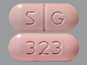 Metaxalone: This is a Tablet imprinted with S G on the front, 323 on the back.