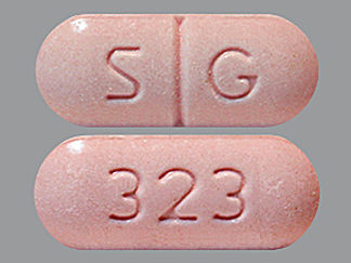 This is a Tablet imprinted with S G on the front, 323 on the back.