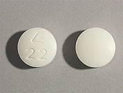 Orphenadrine Citrate: This is a Tablet Er imprinted with E  22 on the front, nothing on the back.