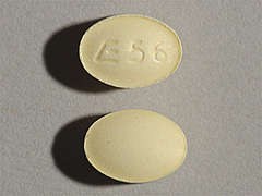 This is a yellow oval Tablet imprinted with E 56 on the front, nothing on the back, and is manufactured by SANDOZ.