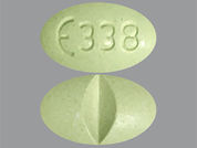 Molindone Hcl: This is a Tablet imprinted with logo and 338 on the front, nothing on the back.