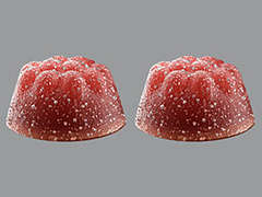 Esto es un Tableta Masticable rojo fruit imprimido con nada en la parte delantera, nada en la parte posterior, y es fabricado por EXELTIS USA, IN.