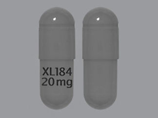 This is a Capsule imprinted with XL184  20 mg on the front, nothing on the back.