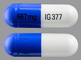 This is a Capsule imprinted with 667 mg on the front, IG 377 on the back.