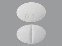 This is a white oval Tablet imprinted with 0.1 on the front, nothing on the back, and is manufactured by FERRING PH INC.