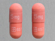 Prograf: Esto es un Cápsula imprimido con 5 mg 5mg en la parte delantera, logo and 657 logo and 657 en la parte posterior, y es fabricado por None.