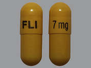 Memantine Hcl Er: This is a yellow oblong Capsule Sprinkle Er 24 Hr imprinted with FLI 7 mg on the front, nothing on the back, and is manufactured by APOTEX CORP.