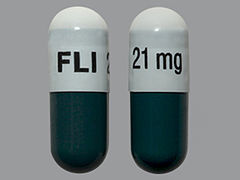 This is a Capsule Sprinkle Er 24 Hr imprinted with FLI 21 mg on the front, nothing on the back.