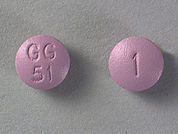 Trifluoperazine Hcl: This is a lavender round Tablet imprinted with GG  51 on the front, 1 on the back, and is manufactured by SANDOZ.