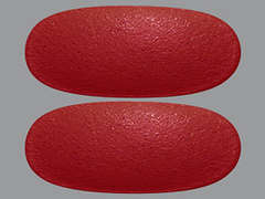 This is a red oblong Tablet imprinted with nothing on the front, nothing on the back, and is manufactured by GERI-CARE.