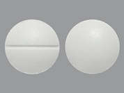 Vitamin B-6: Esto es un Tableta blanco redondo imprimido con nada en la parte delantera, nada en la parte posterior, y es fabricado por GERI-CARE.