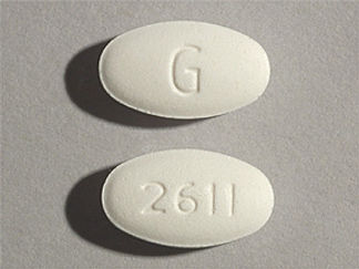This is a Tablet imprinted with G on the front, 2611 on the back.