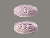 Carbidopa-Levodopa Er: This is a Tablet Er imprinted with G on the front, 392 on the back.