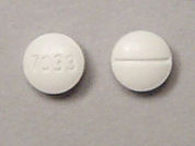 Fludrocortisone Acetate: This is a Tablet imprinted with 7033 on the front, nothing on the back.