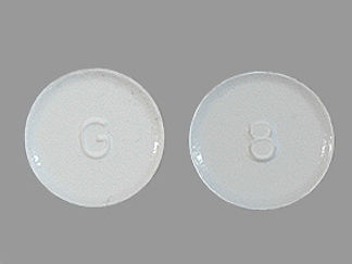 Esto es un Tableta De Desintegración imprimido con G en la parte delantera, 8 en la parte posterior, y es fabricado por None.