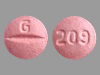 This is a Tablet imprinted with G on the front, 209 on the back.