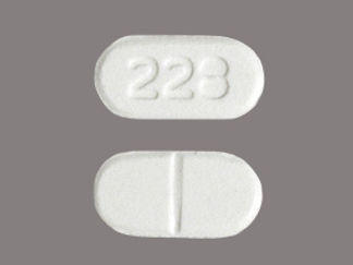 This is a Tablet Chewable Dispersible imprinted with 228 on the front, nothing on the back.