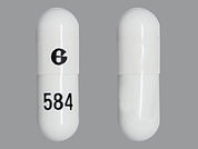 Aprepitant: This is a Capsule imprinted with G on the front, 584 on the back.