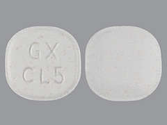 This is a white elliptical Tablet Chewable Dispersible imprinted with GX  CL5 on the front, nothing on the back, and is manufactured by GLAXOSMITHKLINE.