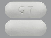 Metformin Hcl Er: This is a Tablet Er 24 Hr imprinted with G 7 on the front, nothing on the back.
