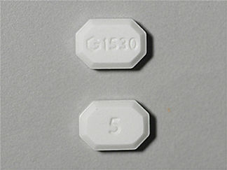 This is a Tablet imprinted with G 1530 on the front, 5 on the back.