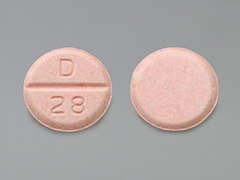 Esto es un Tableta rosa claro redondo imprimido con D en la parte delantera, 28 en la parte posterior, y es fabricado por AUROBINDO PHARM.