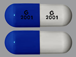This is a Capsule imprinted with G  2001 on the front, G  2001 on the back.
