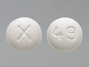 Famciclovir: This is a Tablet imprinted with X on the front, 49 on the back.