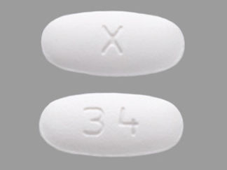 This is a Tablet imprinted with X on the front, 34 on the back.
