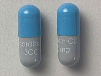 This is a Capsule Er 24 Hr imprinted with cardizem CD  300 mg on the front, nothing on the back.