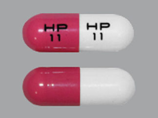 This is a Capsule imprinted with HP  11 on the front, HP  11 on the back.