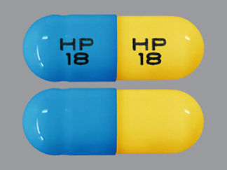 This is a Capsule imprinted with HP  18 on the front, HP  18 on the back.