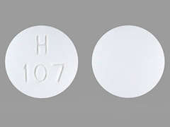 This is a Tablet imprinted with H  107 on the front, nothing on the back.