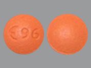 Protriptyline Hcl: This is a Tablet imprinted with logo and 96 on the front, nothing on the back.