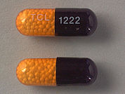 Nitro-Time: This is a Capsule Er imprinted with TCL on the front, 1222 on the back.