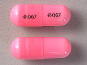 Oxazepam: This is a Capsule imprinted with logo and 067 on the front, logo and 067 on the back.