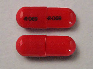 This is a Capsule imprinted with logo and 069 on the front, logo and 069 on the back.