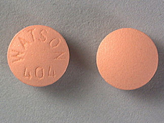 This is a Tablet imprinted with WATSON  404 on the front, nothing on the back.